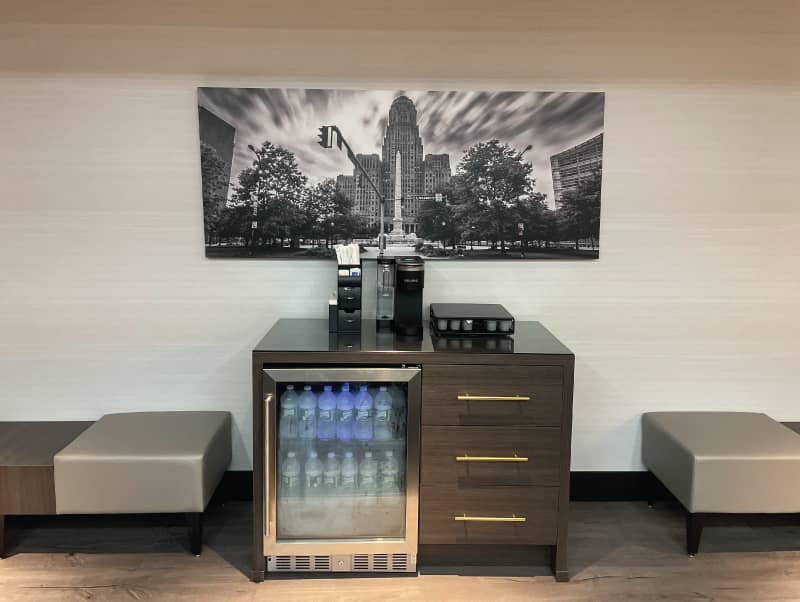 image of a mini fridge and coffee maker in a conference room